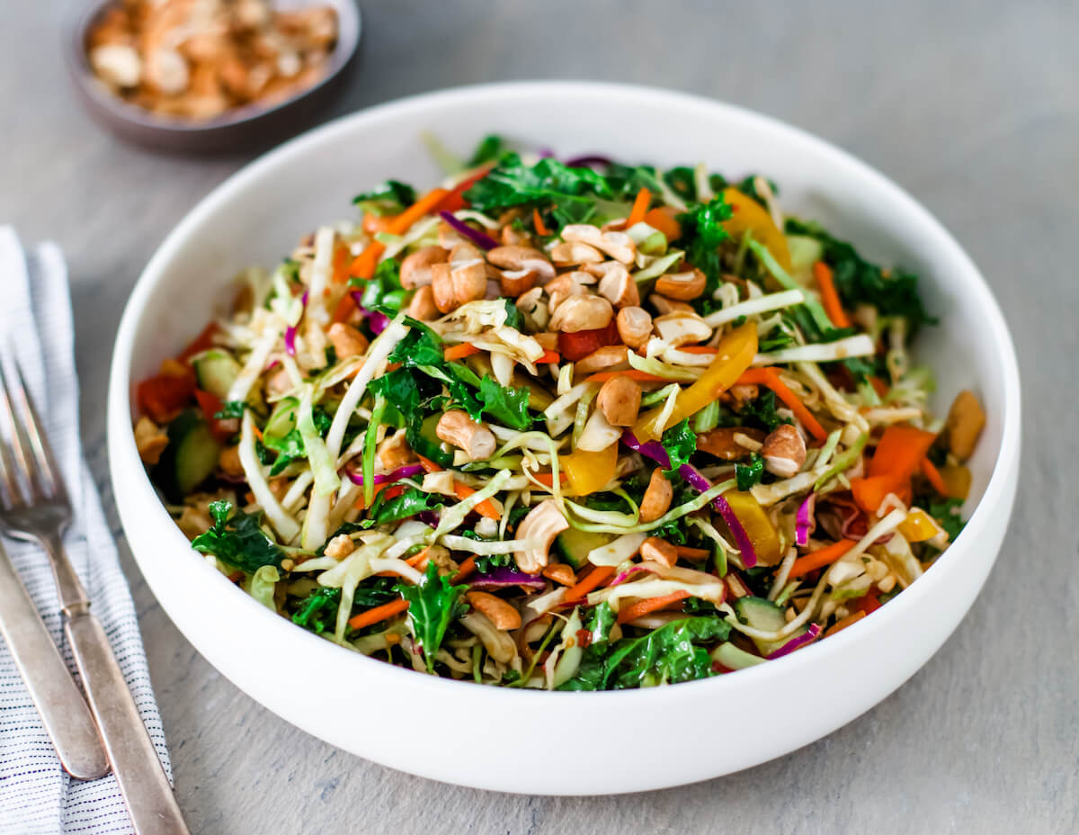 cabbage slaw salad with cashews and kale