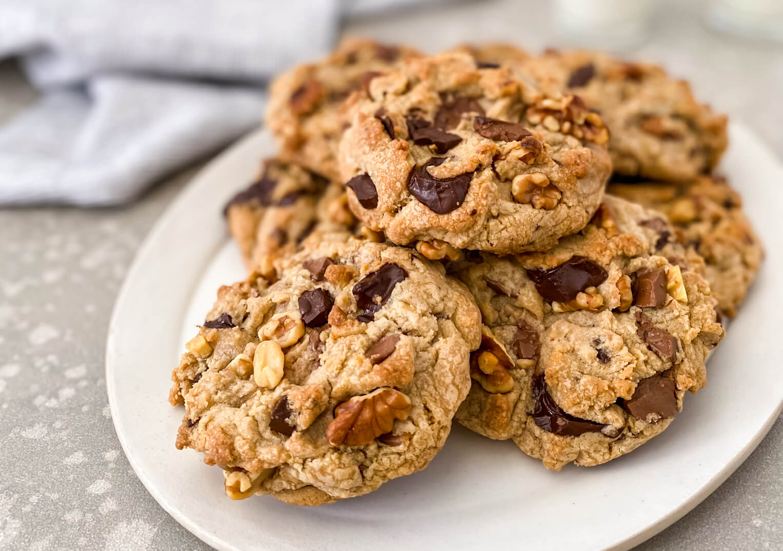 plate of walnut chocolate chip cookies