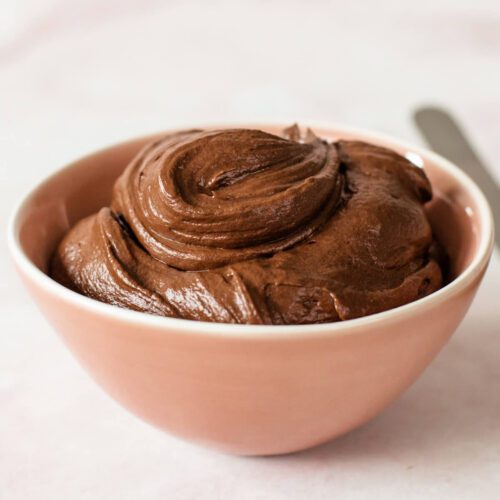 close up of whipped chocolate ganache frosting