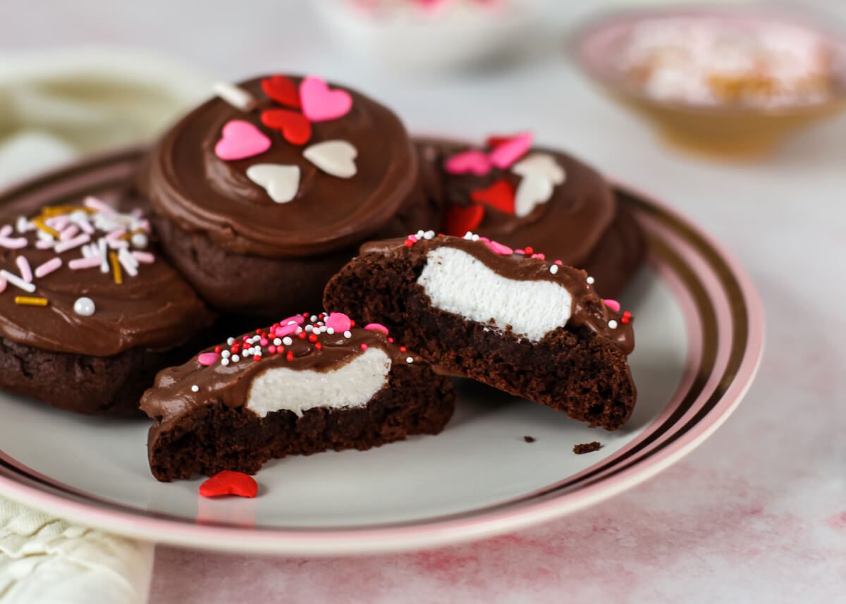cut open valentines cookies to reveal a marshmallow