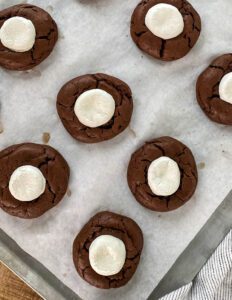 baked chocolate marshmallow valentines cookies on a baking sheet