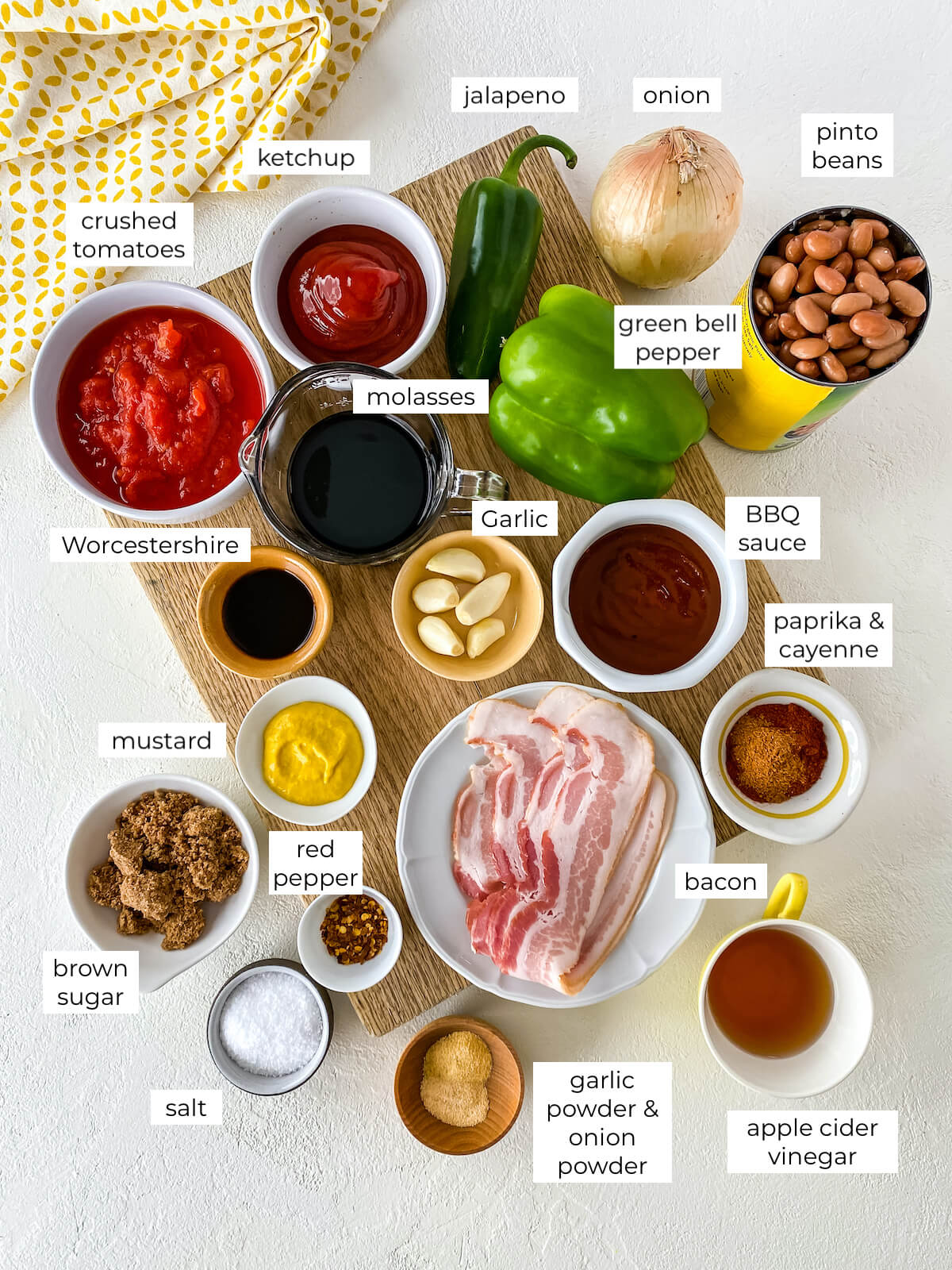 BBQ baked beans ingredients on a cutting board