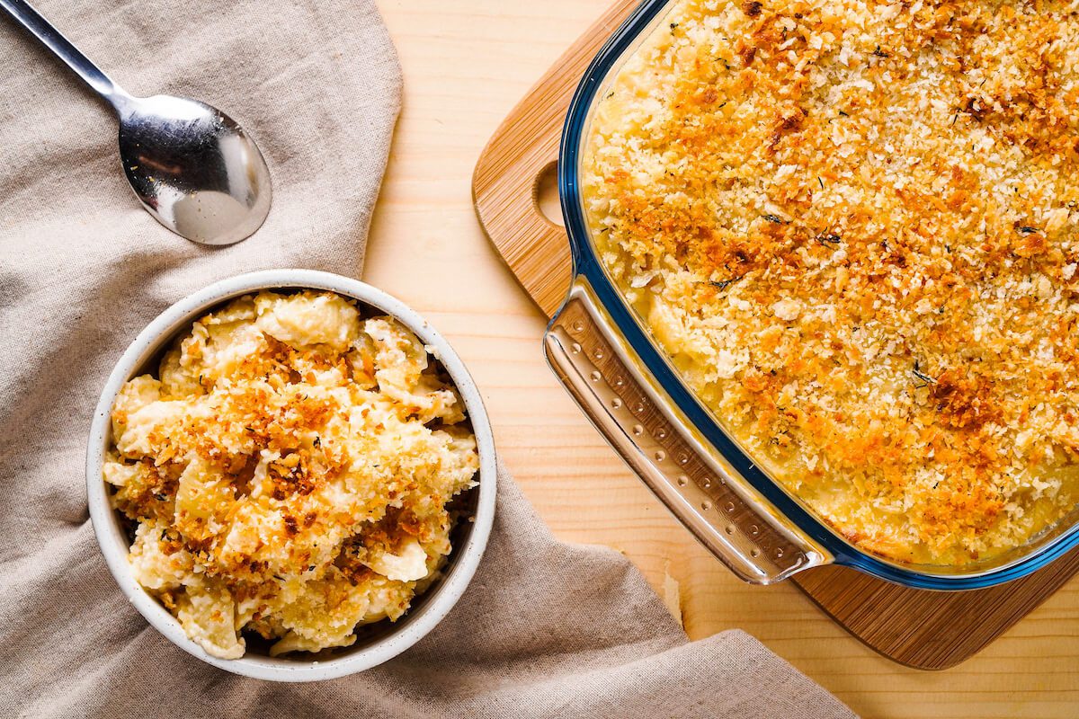 Mac and cheese with breadcrumbs ready to serve on a table.
