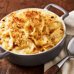 toasted bread crumbs on caramelized onion and smoked gouda mac and cheese