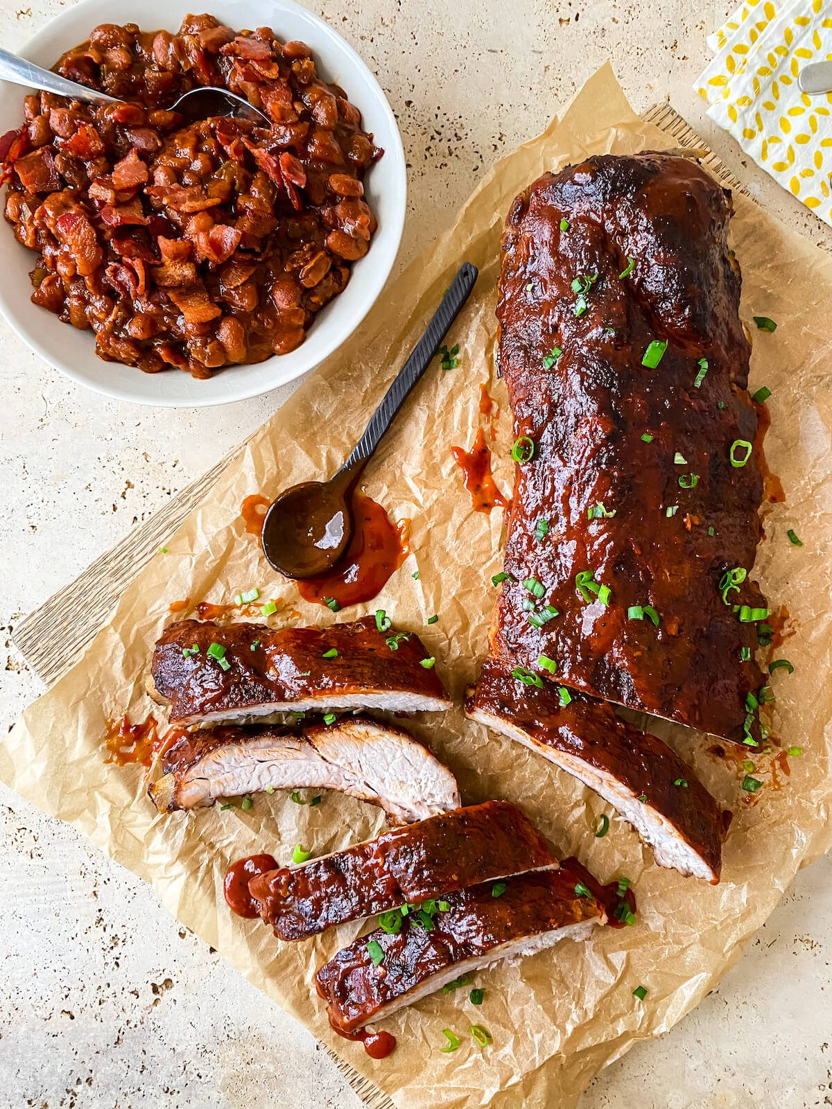 cut up oven baked bbq ribs and baked beans