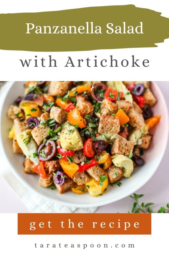 Tomato and artichoke panzanella pin image of salad in bowl