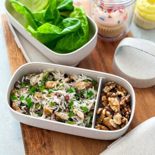 close up of chicken lettuce wraps in packed lunch container