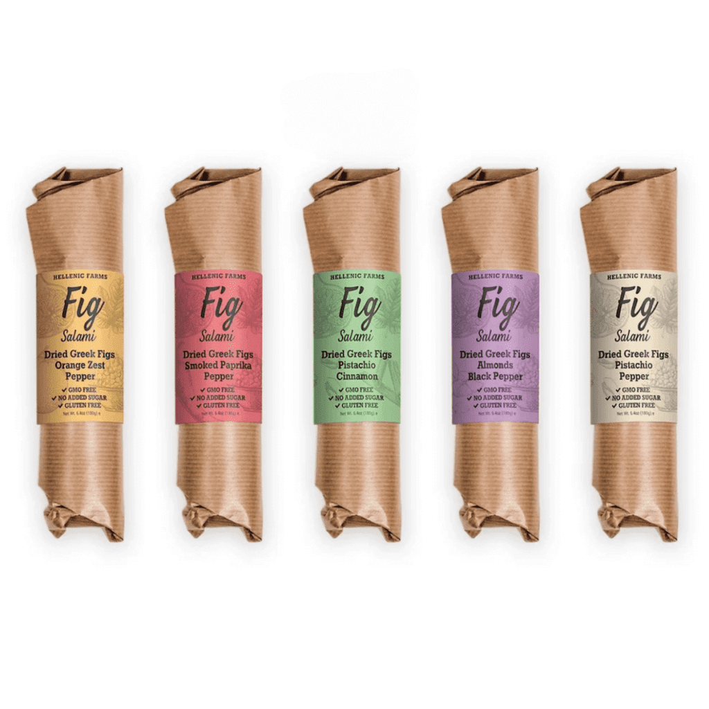 5 flavored, packaged fig logs over a white background