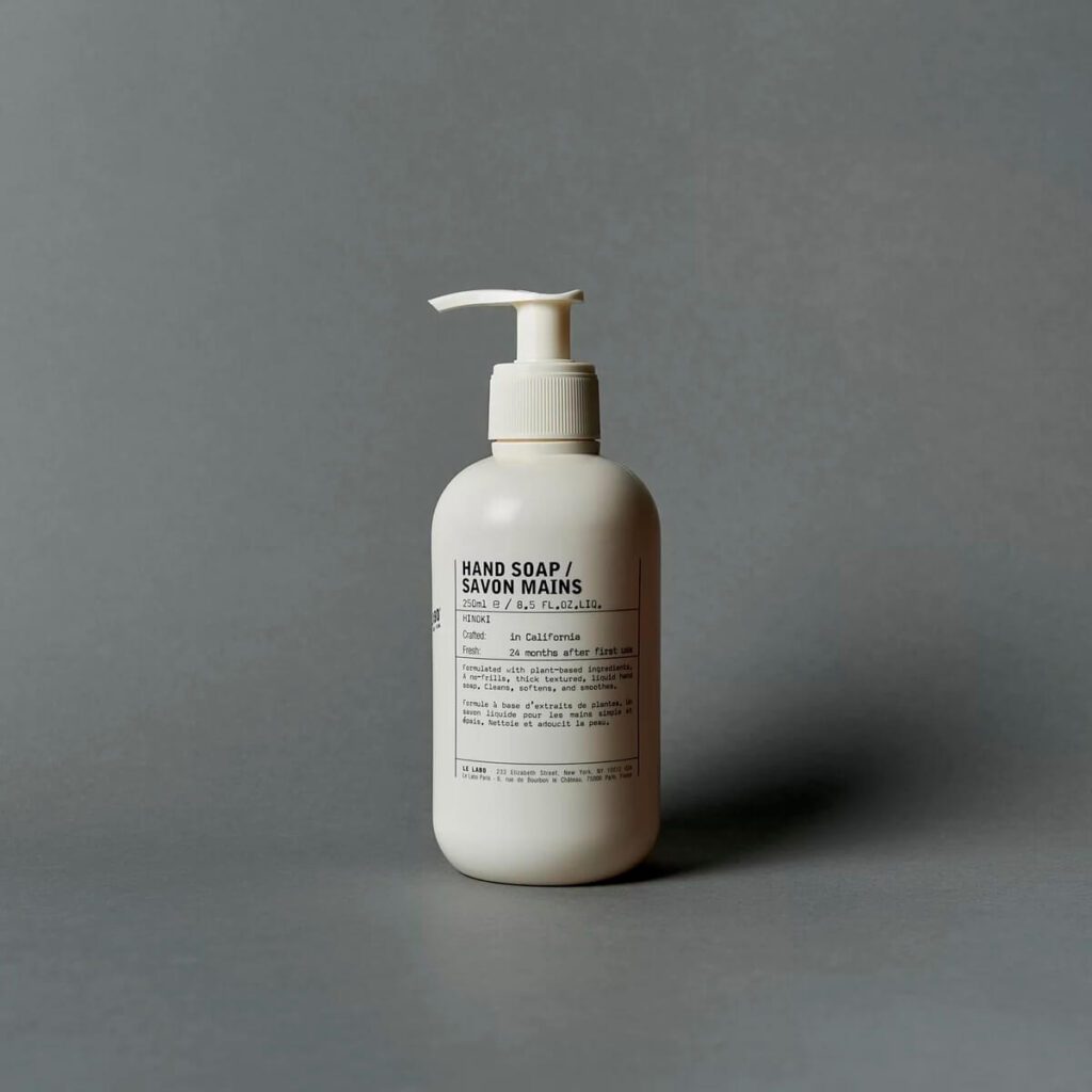 One Le Labo hand soap, packaged in a plain cream dispenser.