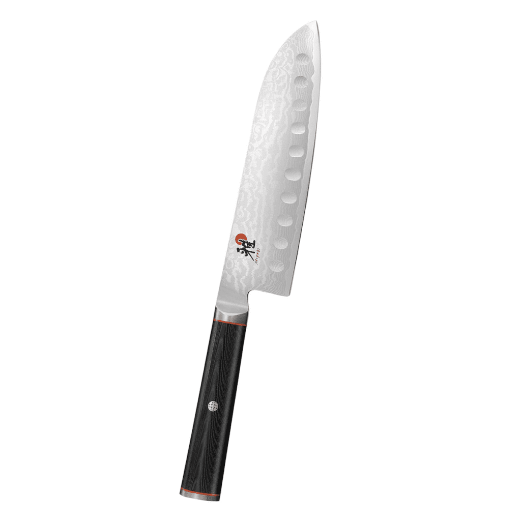 The Miyabi Kaizen Hollow wedge Santoku knife with a black handle and red accent, over a plain white background.