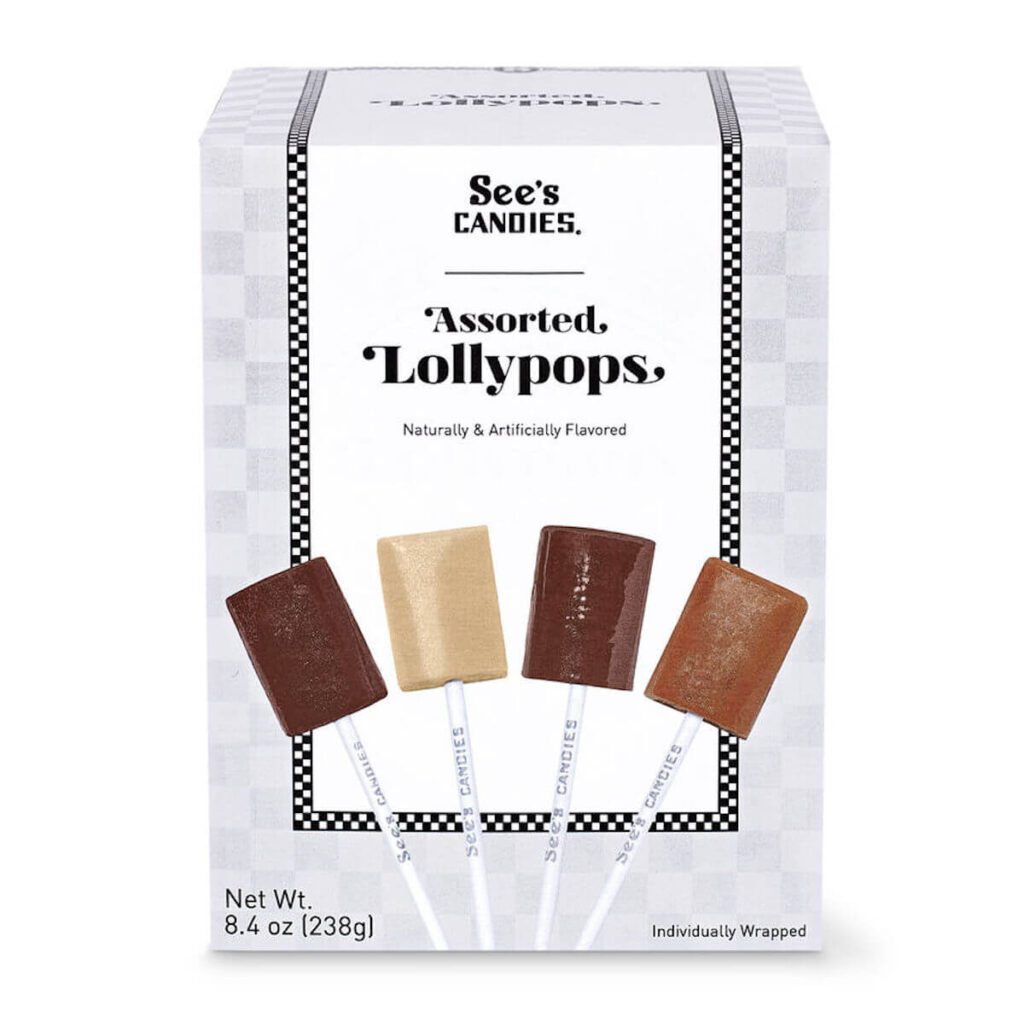 A package of See's Candies Assorted Lollypops, which has an image of the four lollypop flavors it contains.