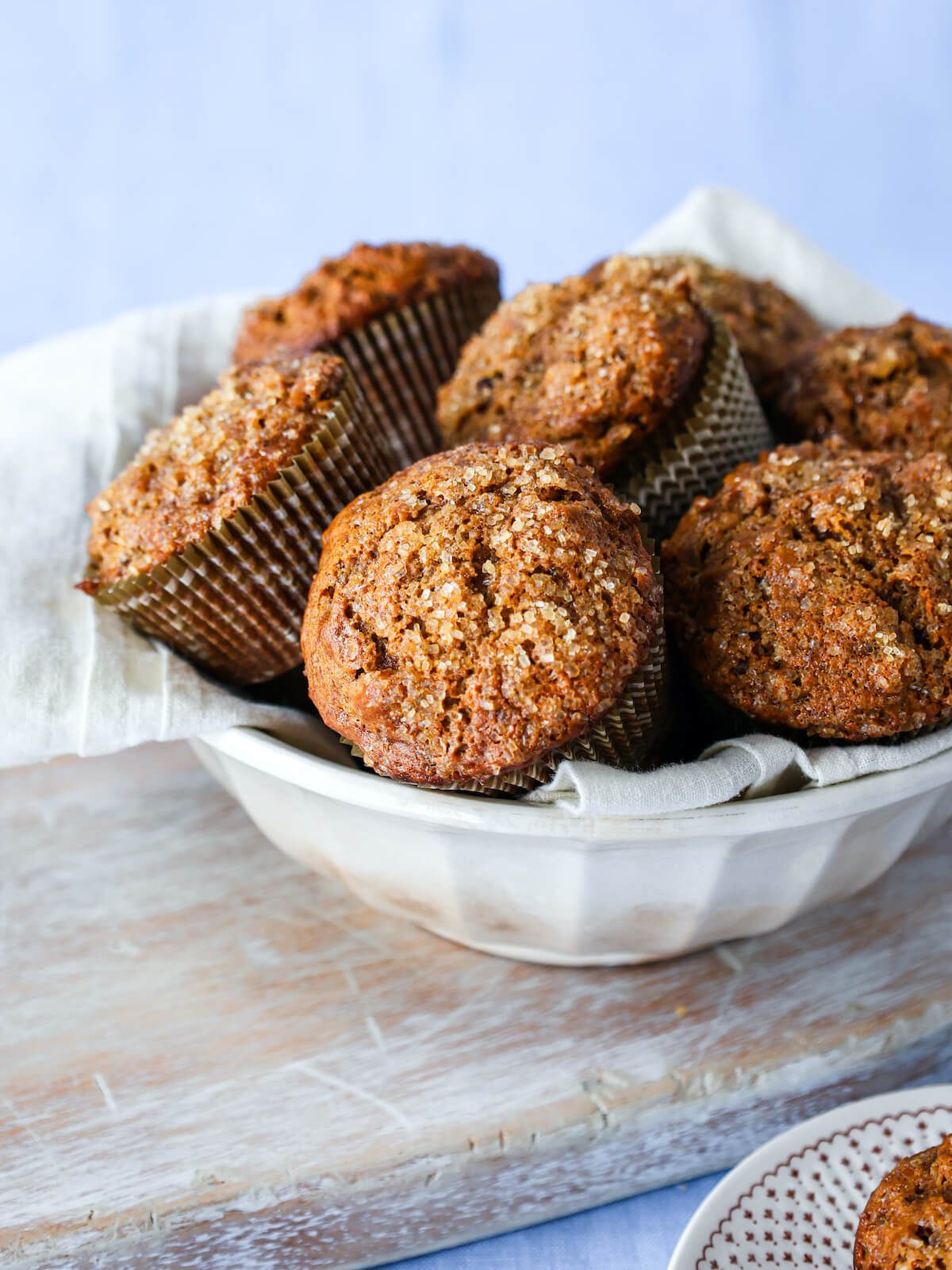 Bran muffins in an ironstone white bowl.