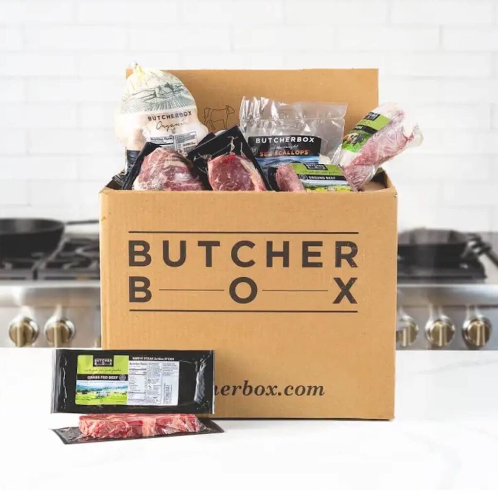 Butcher Box shipping package filled 100% grass-fed beef, free-range organic chicken, pork, and wild-caught seafood products.