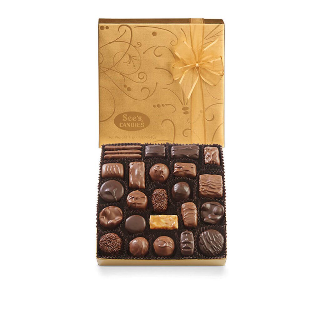 A box of See's Candies Gold Fancy chocolates in their cold box, displaying the variety of chocolates it holds.