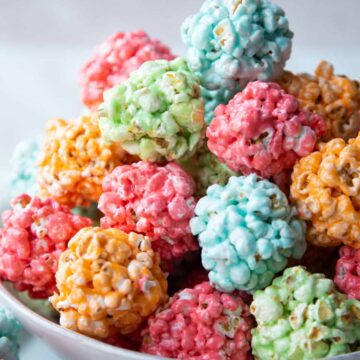 A stack of colorful popcorn balls.