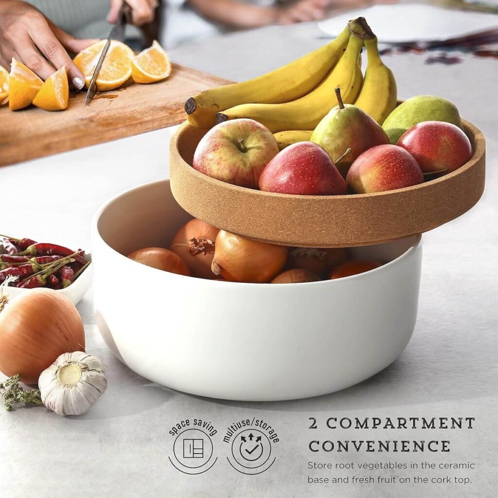 Large 11X11 Kamstein produce bowl made of white ceramic with a natural cork lid, filled with produce both in the ceramic bowl and on top of the cork lid.