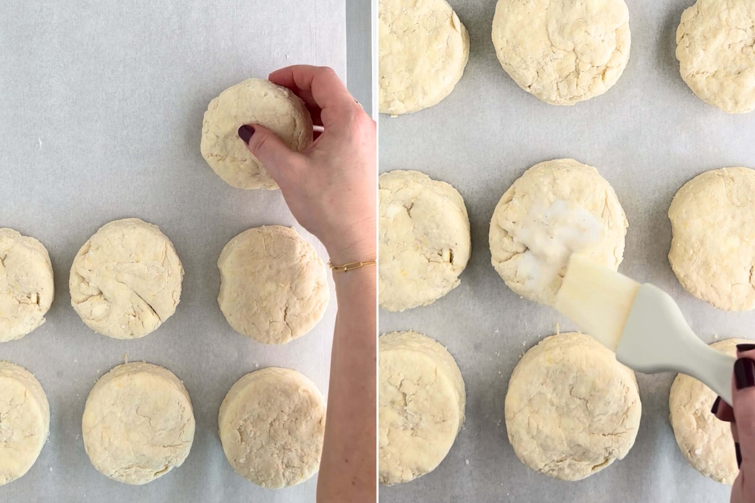Placing raw lemon biscuits on a parchment paper lined baking sheet and brushing the dough with milk.