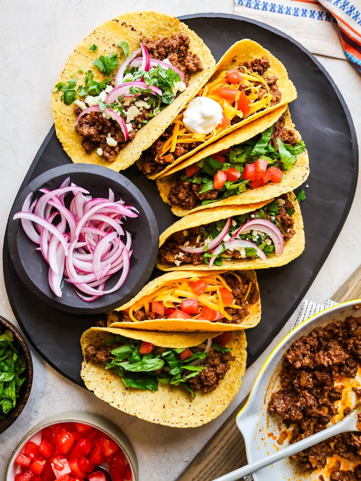 Family style beef tacos with all the toppings.