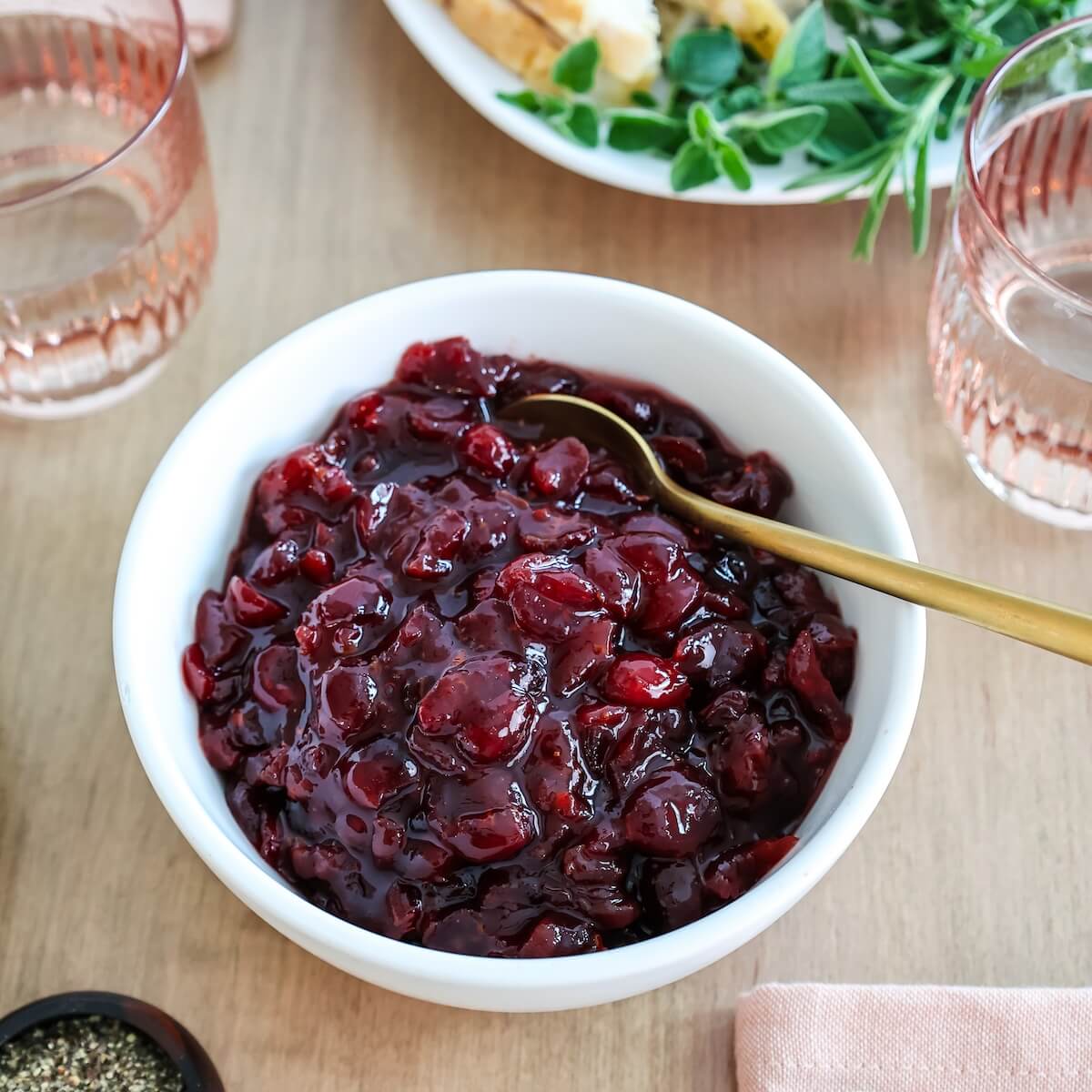 cranberry sauce from dried cranberries in a bowl on a table with turkey.