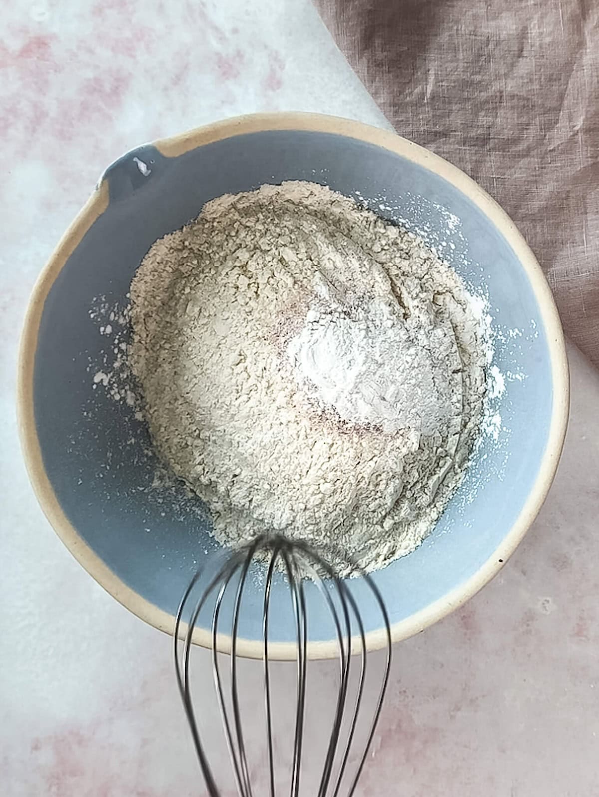 A bowl of dry blondie bar ingredients.