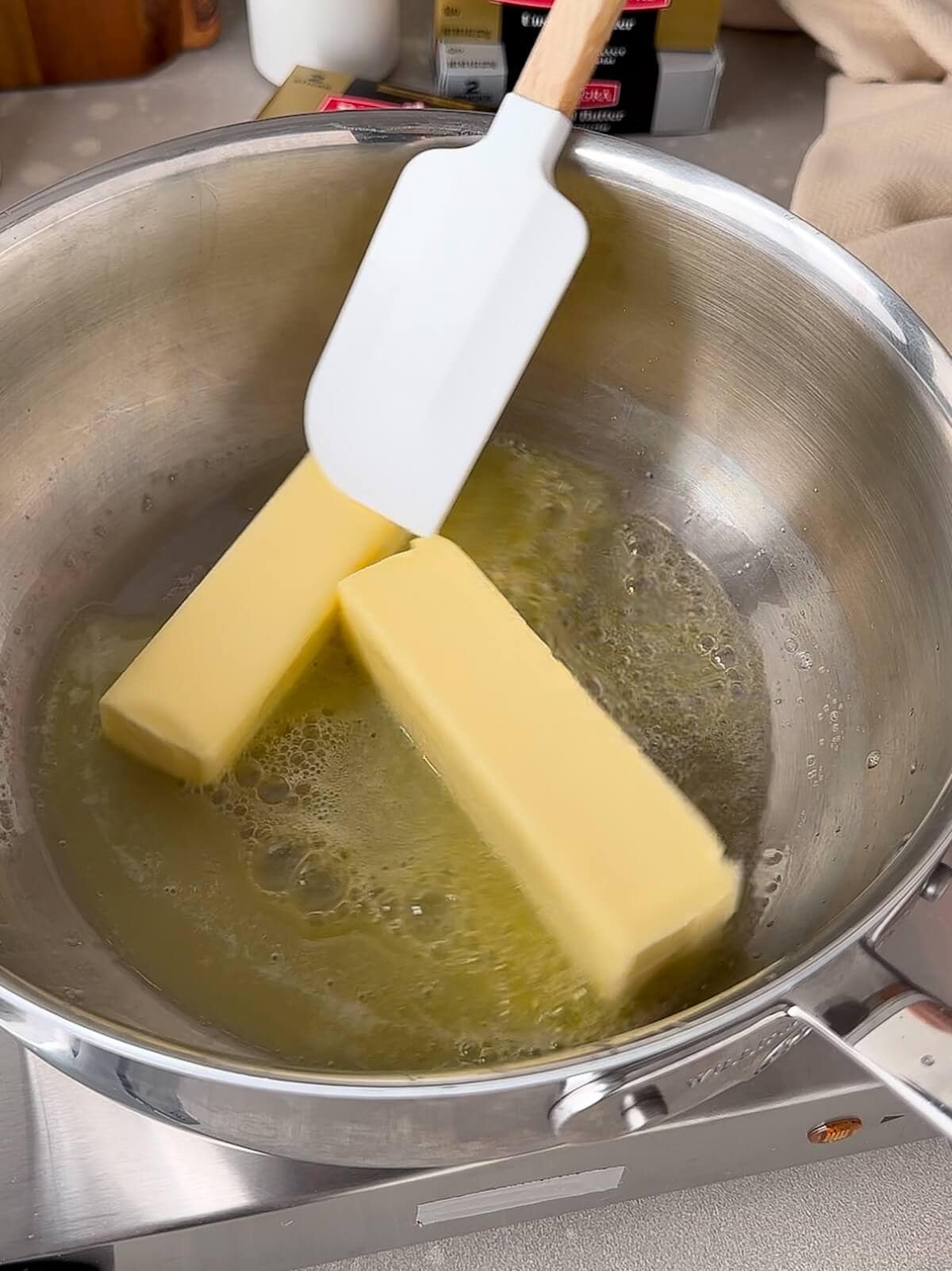 Melting butter in a sauce pan.