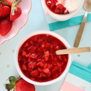 Top view of a bowl of strawberry ice cream sauce.