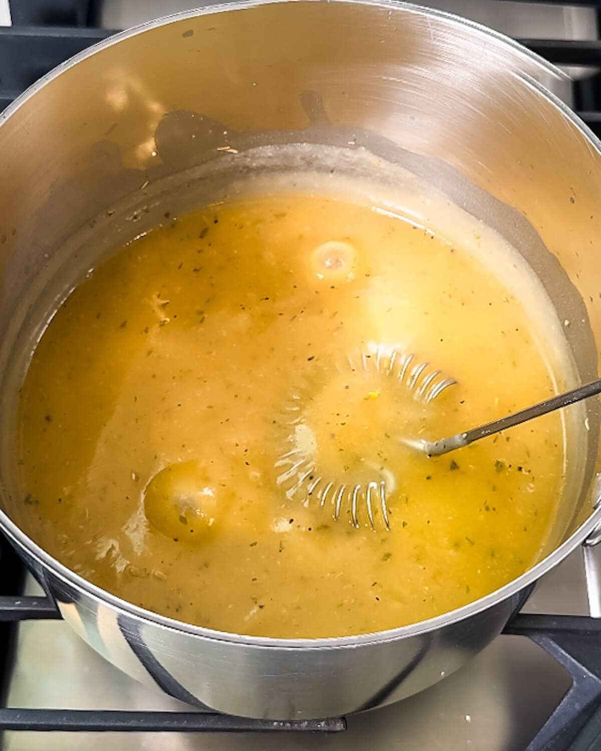 Boiling gravy in a saucepan.
