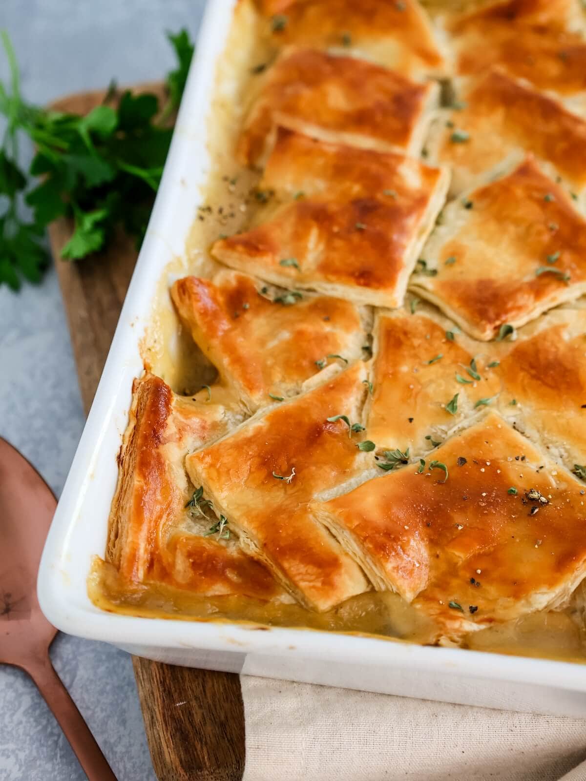 close up of puff pastry crust on turkey pie.