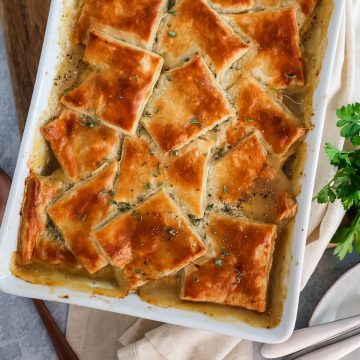 Overhead shot of puff pastry top on turkey pot pie.