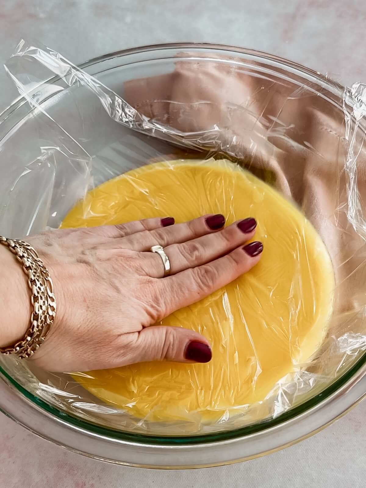 Cover lemon curd with plastic wrap and chill until cooled completely.