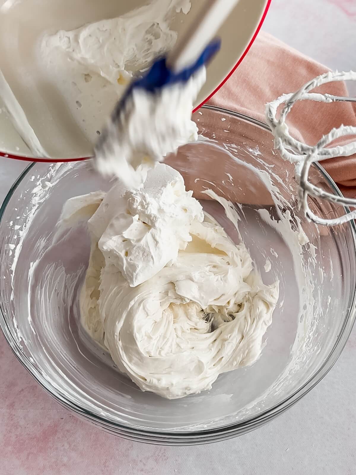 Add whipped cream to the cream cheese mixture to lighten it.