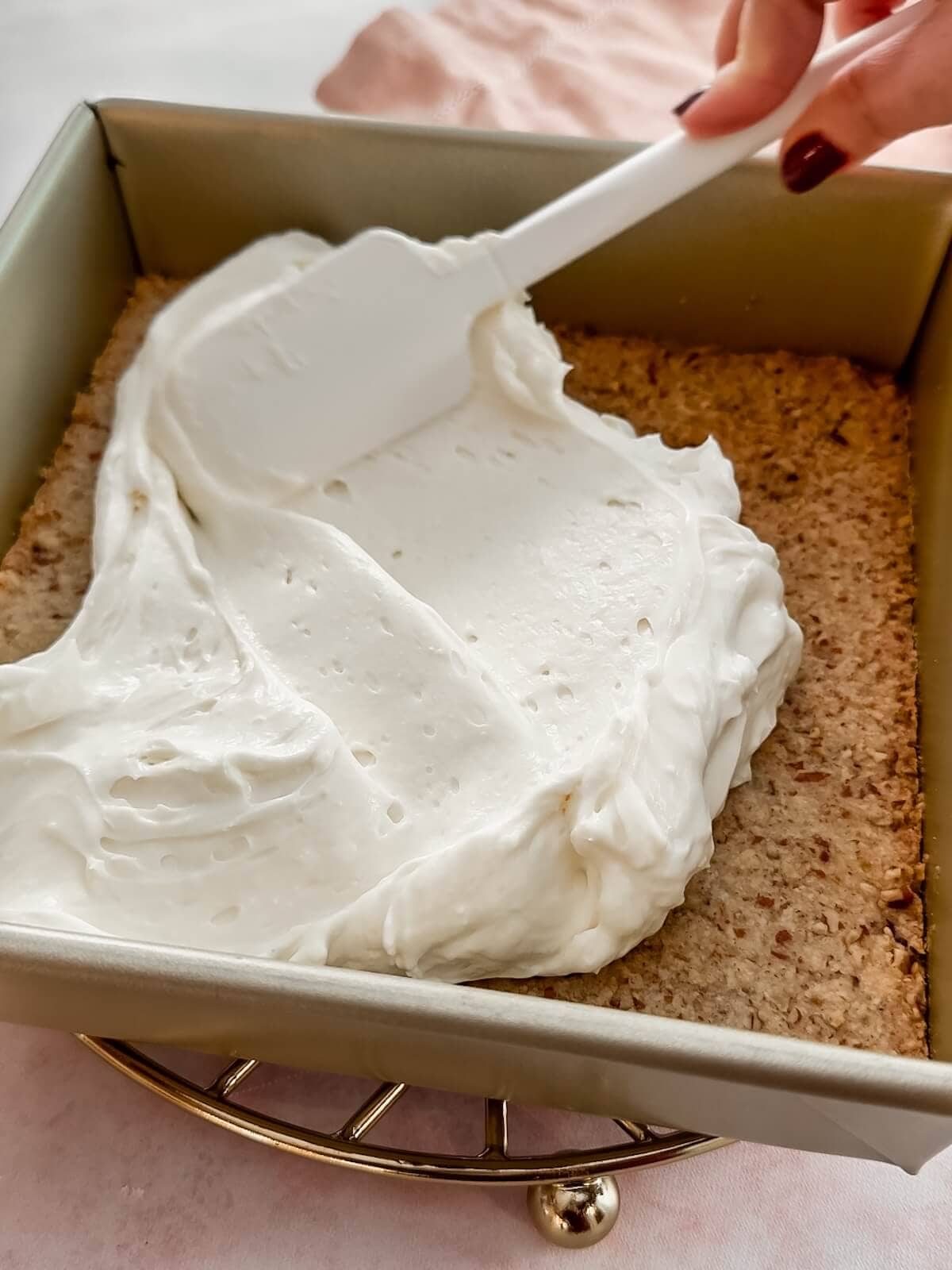 spread cream cheese layer on top of cooked and cooled crust for lemon lush.
