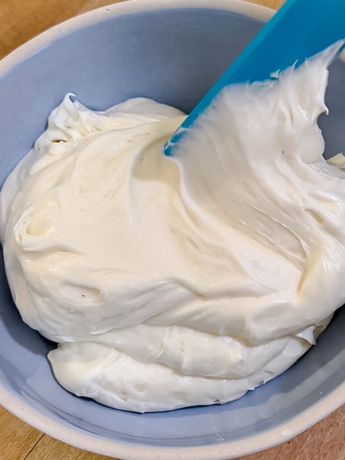 cream cheese frosting in a bowl.