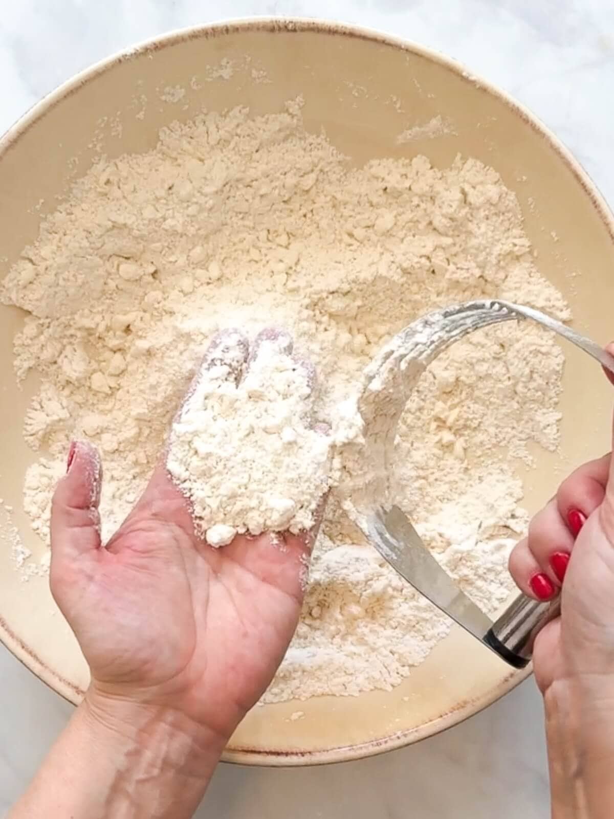 Butter cut into flour in fine crumbs about the size of a pea.