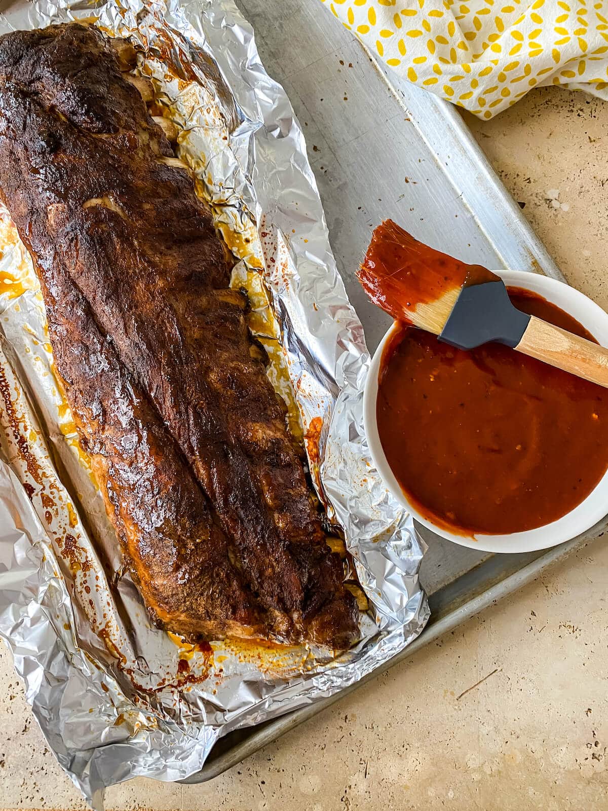 Finished rubbed ribs that were baked in the oven in foil.