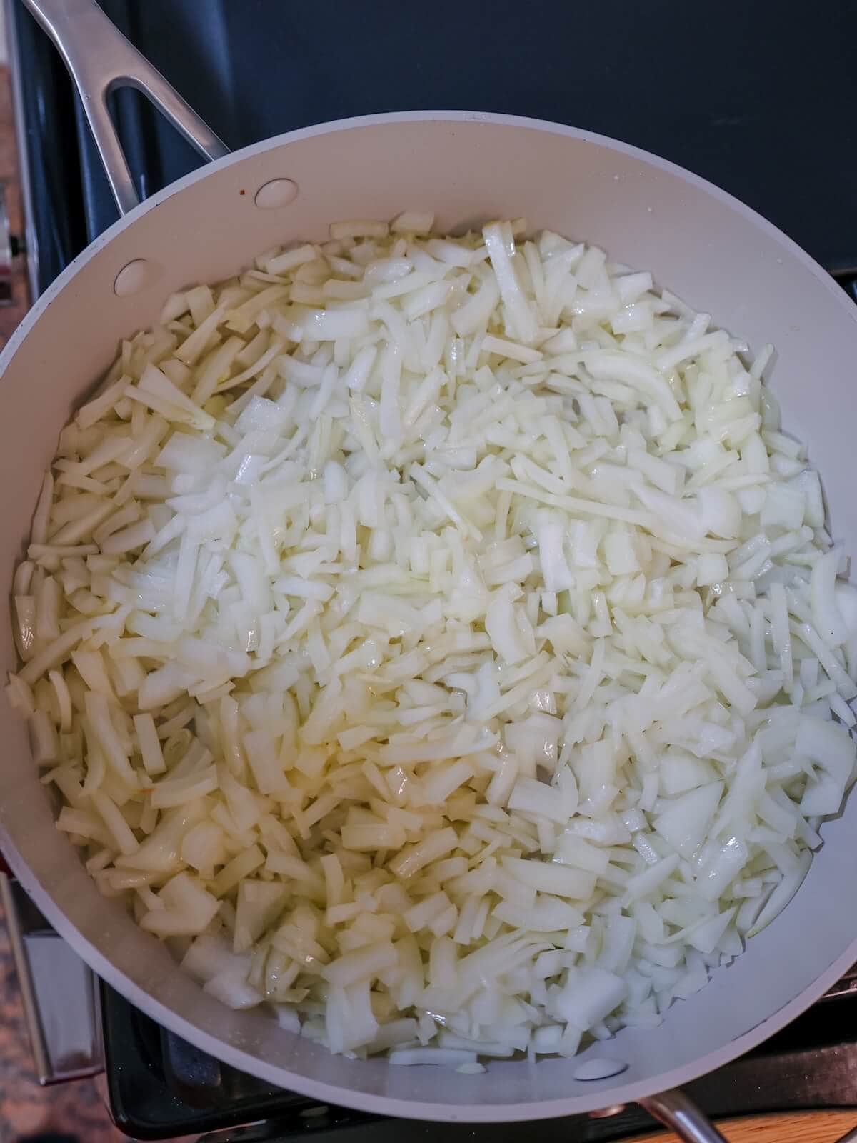 Cook onions in the same pan after cooking the bacon for onion dip.