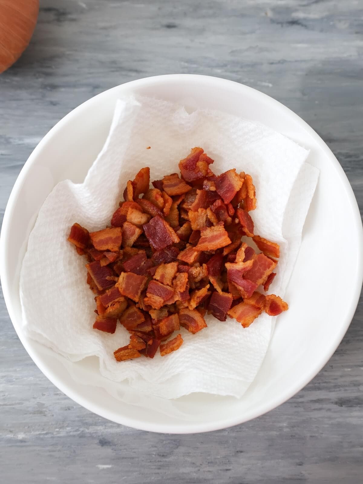 drain cooked bacon on a paper towel when crisp.