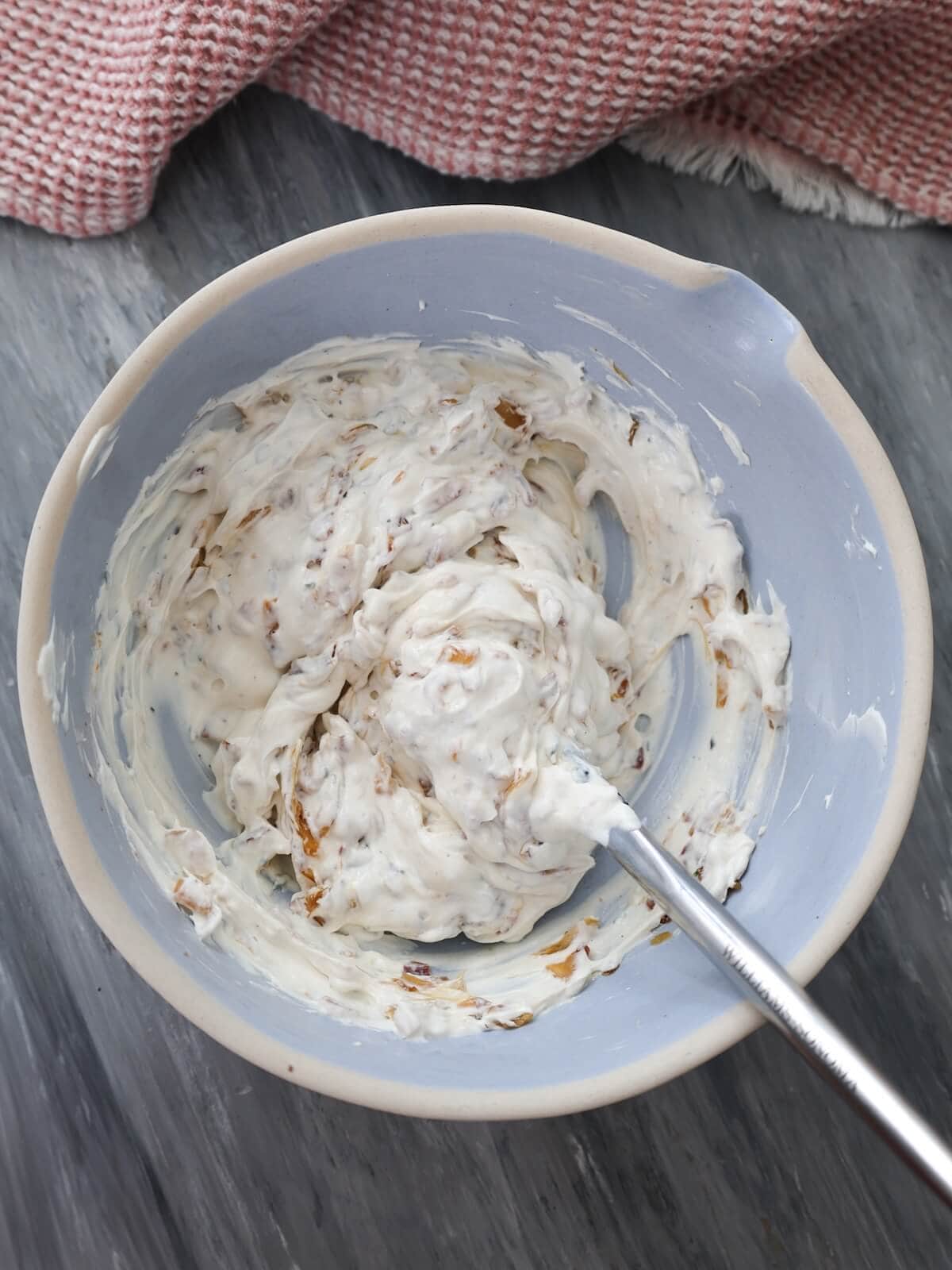 stir onions and bacon into the creamy dip mixture.