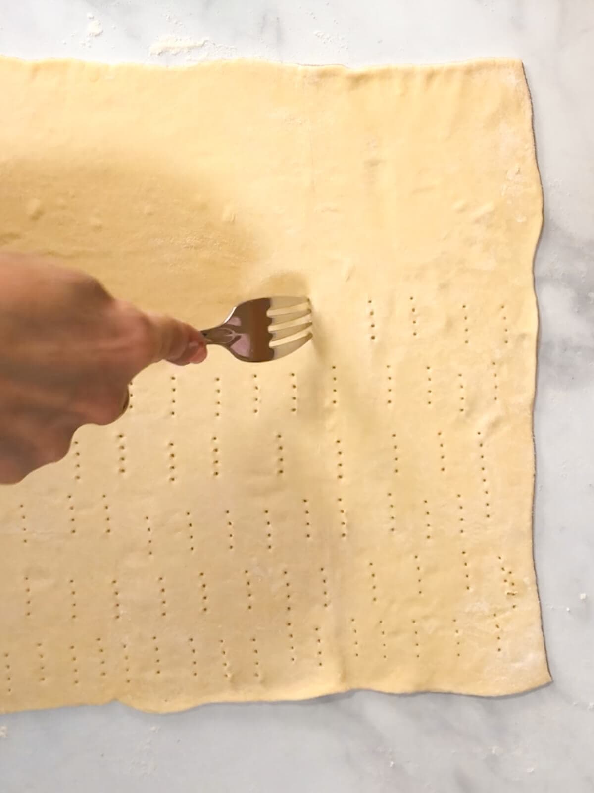 Dock or prick the puff pastry with a fork to prevent large air pockets.