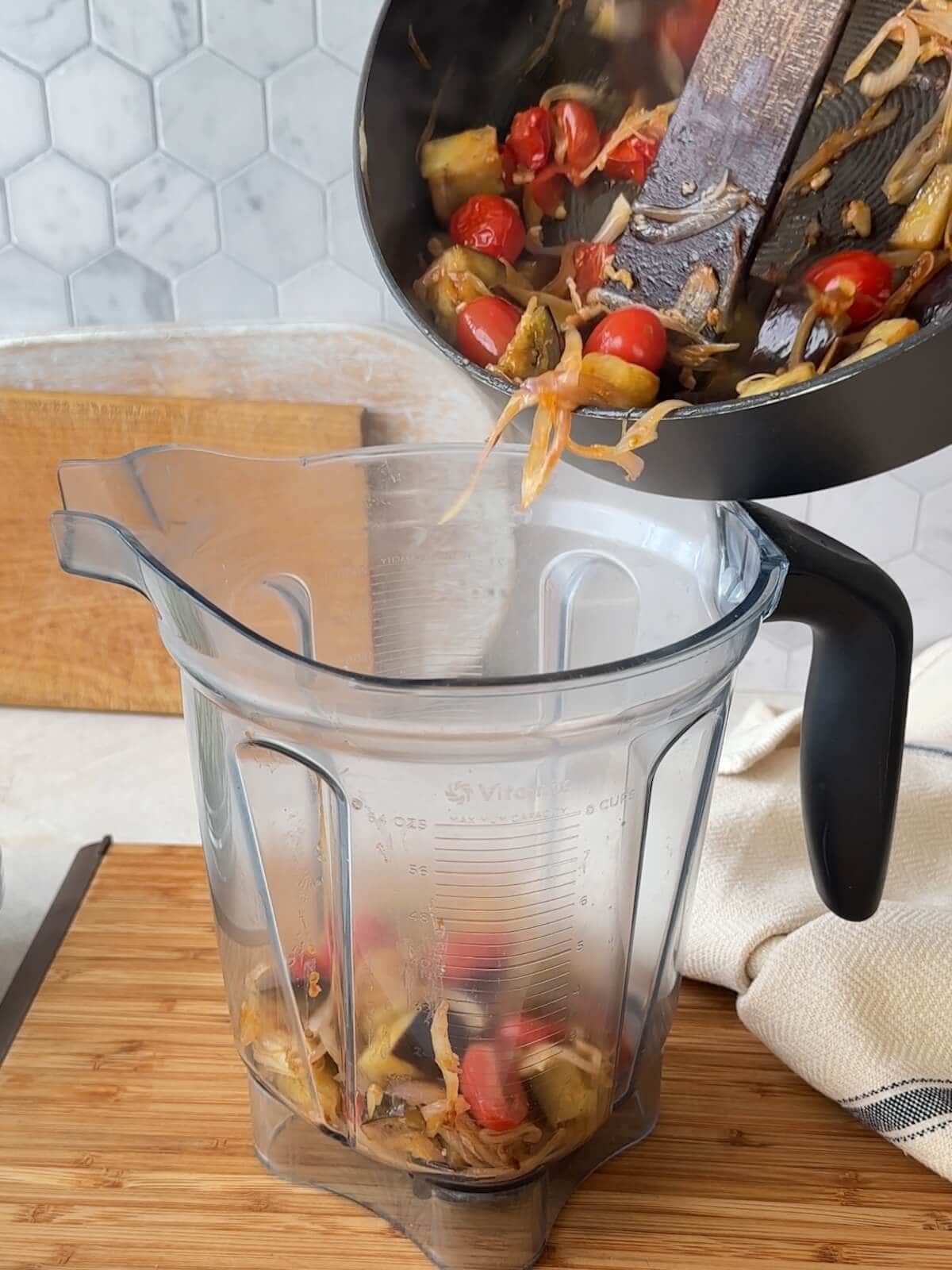 Blend half of the sauteed vegetables in a blender to make a sauce.