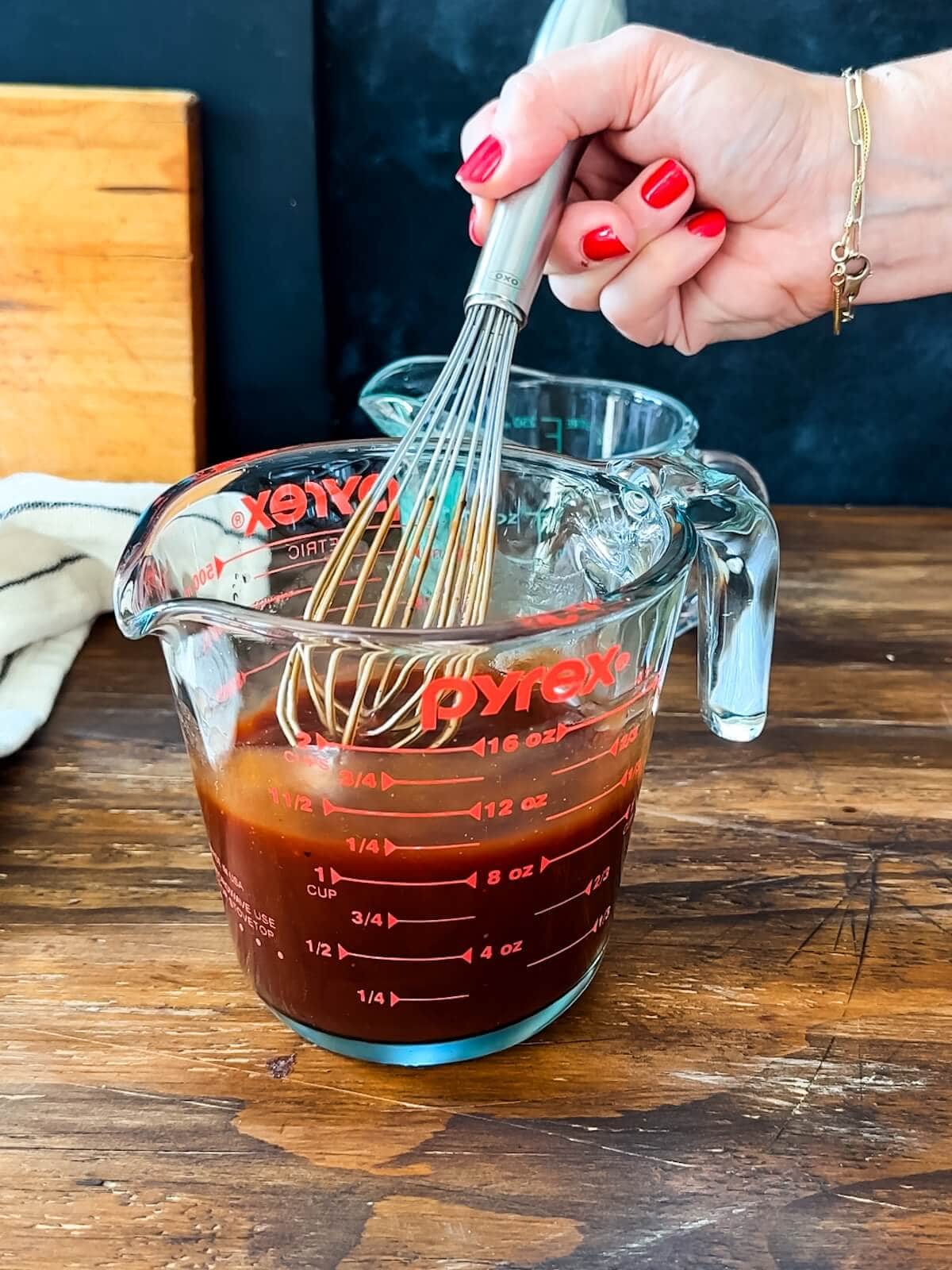 whisk together BBQ sauce and vinegar for the cooking liquid.