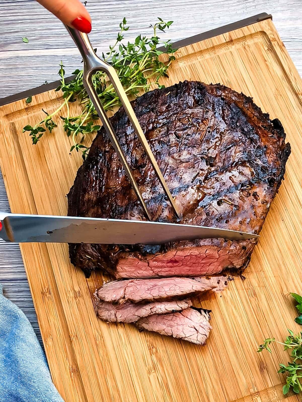 after steak rests for 10 minutes slice across the muscle grain thinly