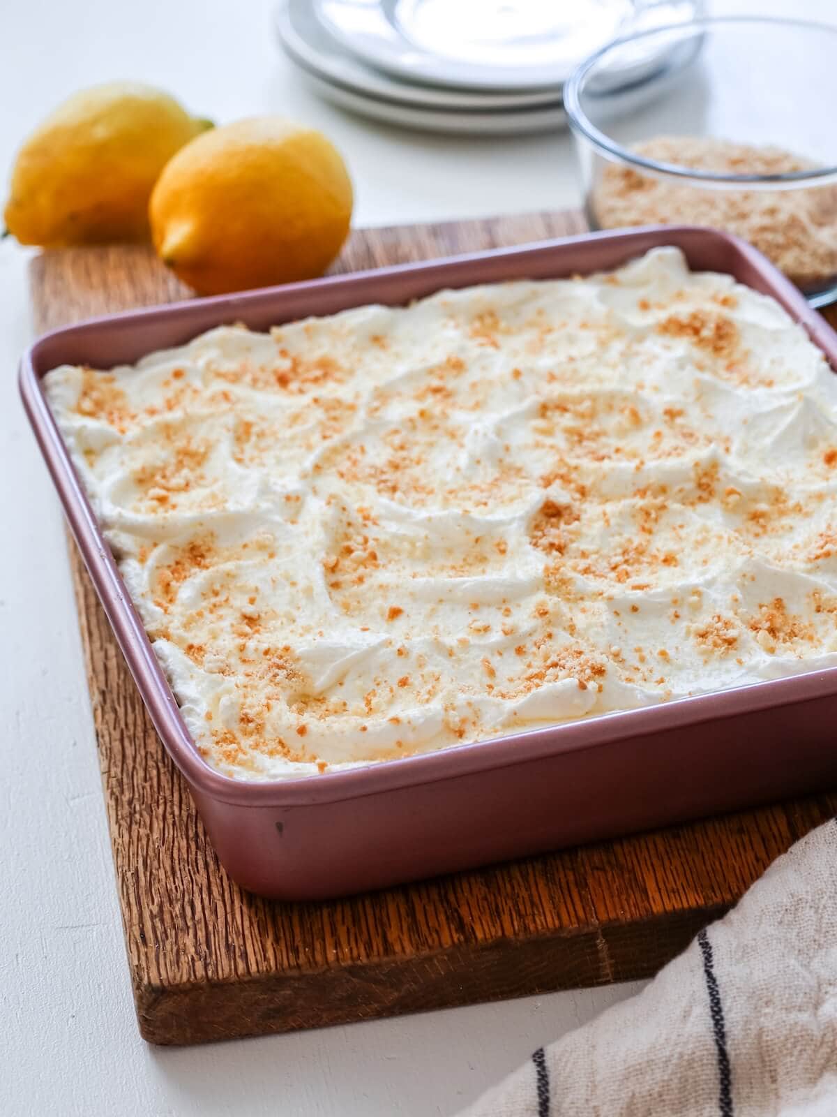 Making lemon icebox dessert in a square pan