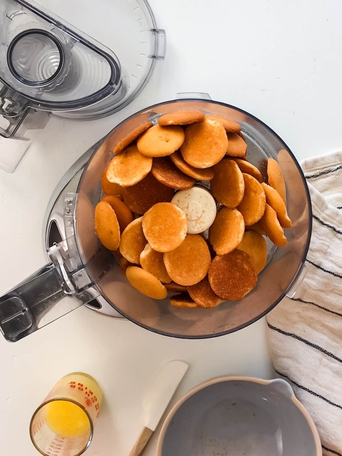 Blending cookies and butter for the crust of lemon icebox pie.