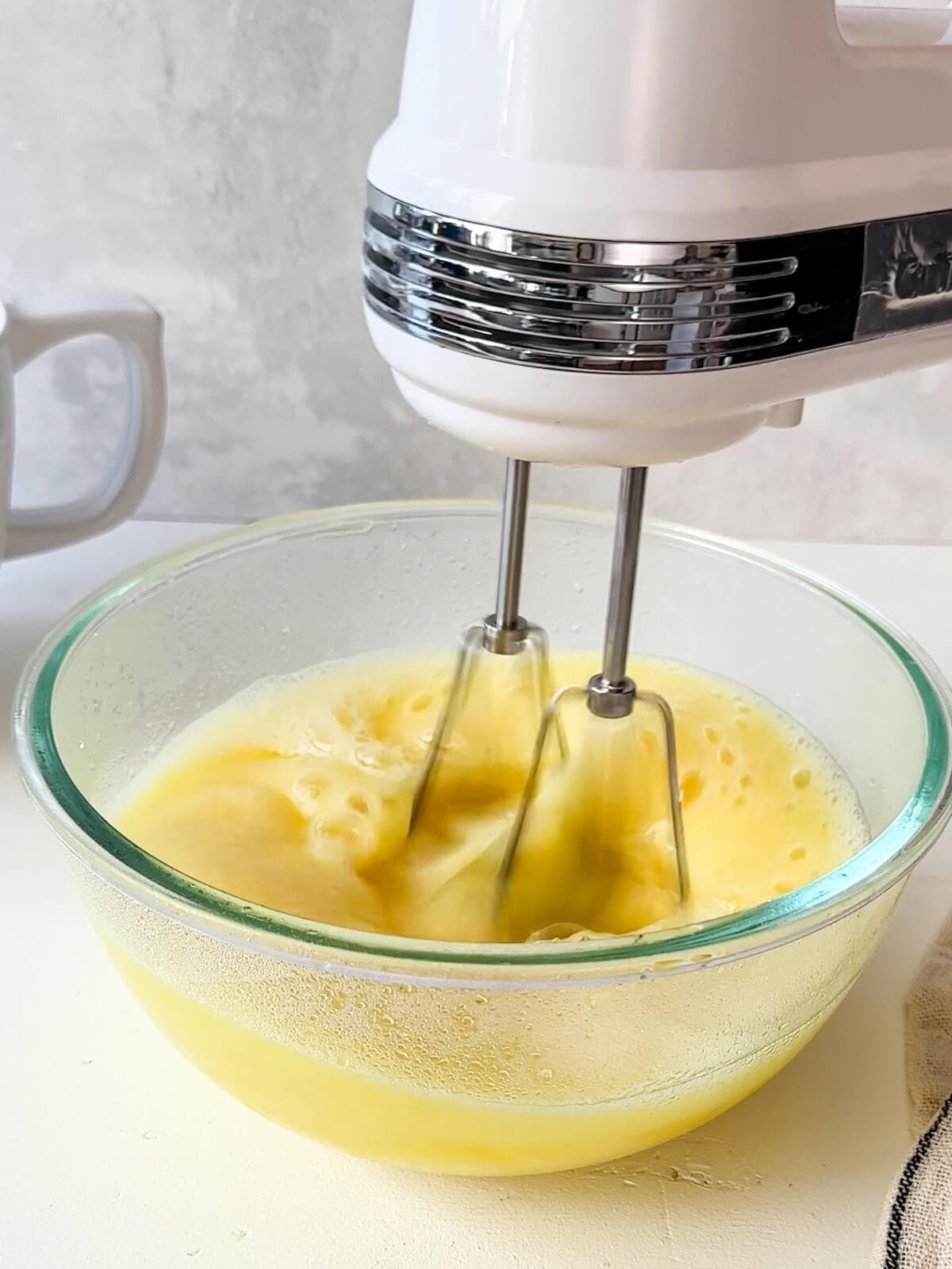 Whipping the chilled gelatine for lemon icebox pie.