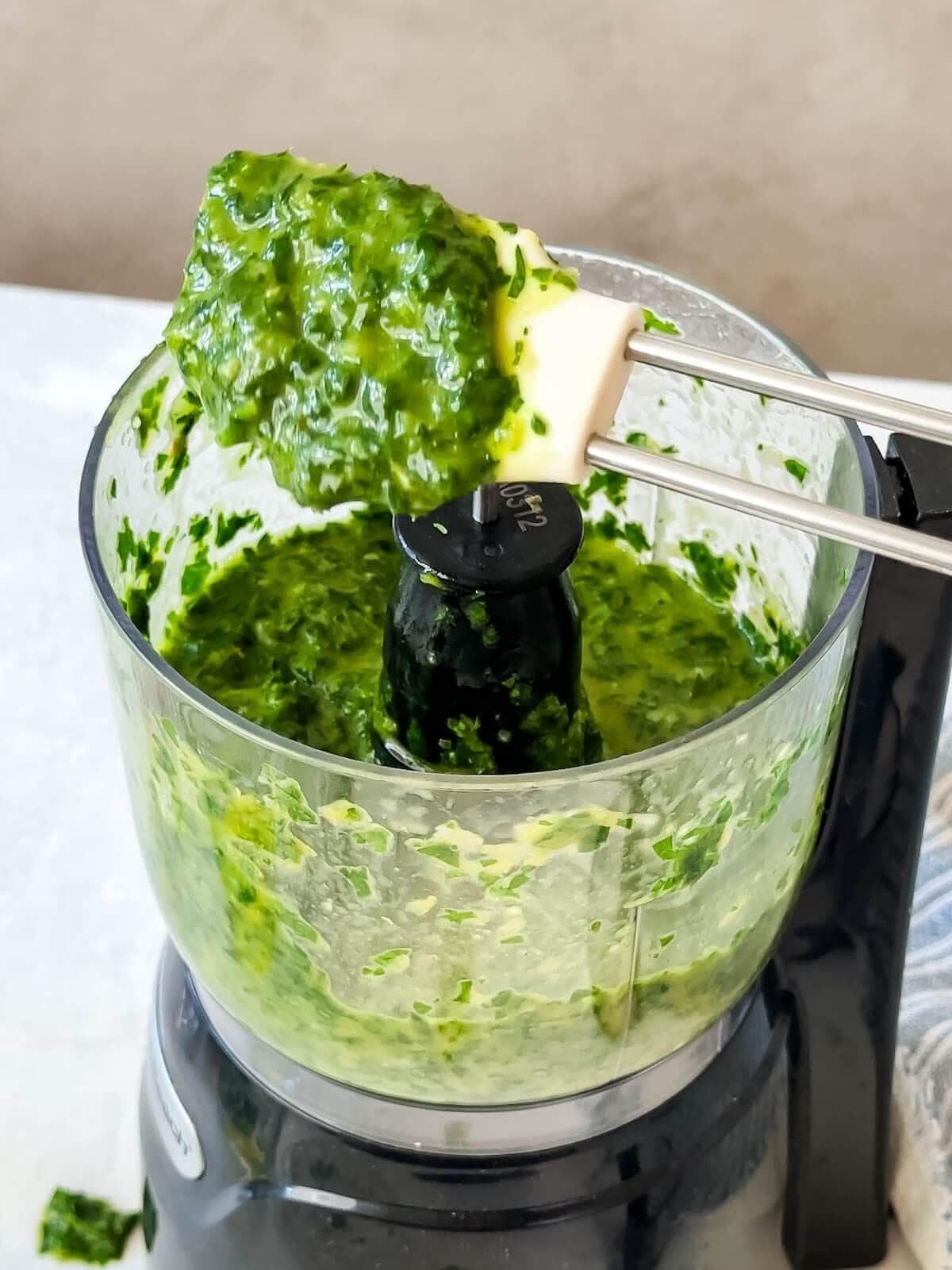 finely chopped salsa verde in a mini food processor. Not quite pureed with little bits of parsley leaf still left for texture.