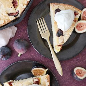 feature image of slices of fig cake with whipped cream