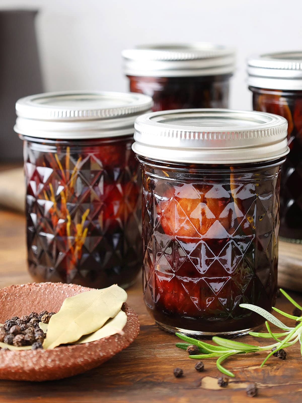 jars of balsamic figs with herbs