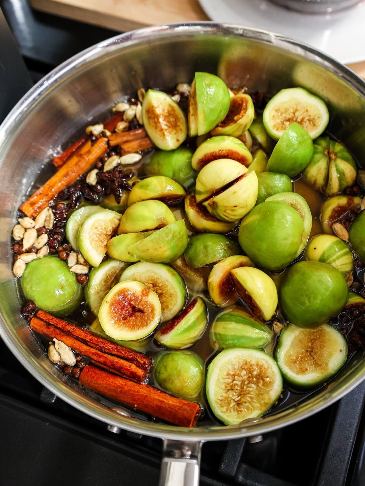 poaching fresh figs in spices and simple syrup.