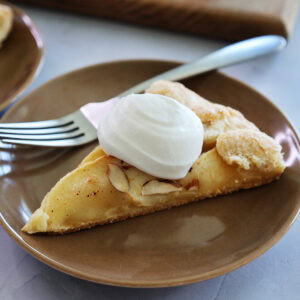 sq feature of apple and frangipane rustic pie with cream.